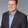 Headshot of Adam Holmes