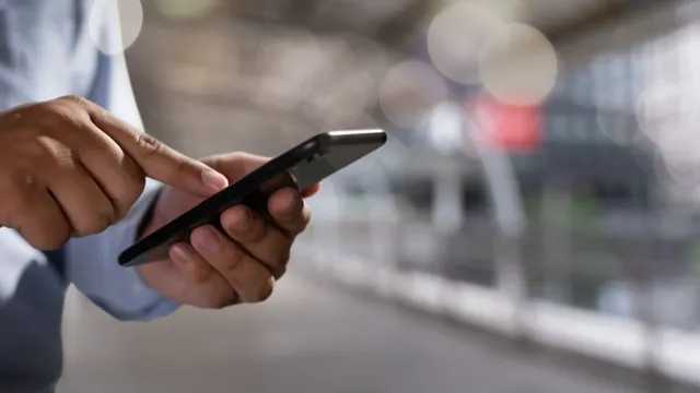 Business professional using mobile phone for work calls